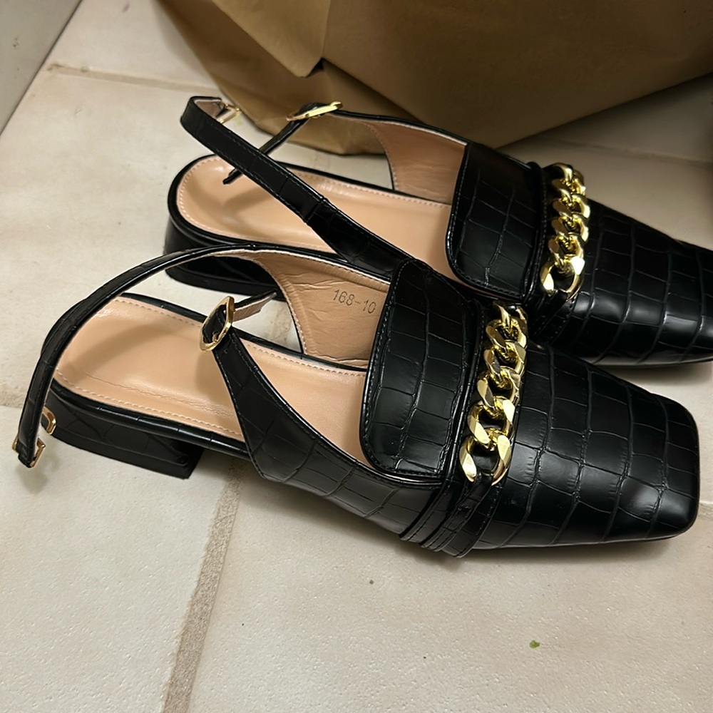 Off Brand mule shoes with strap.